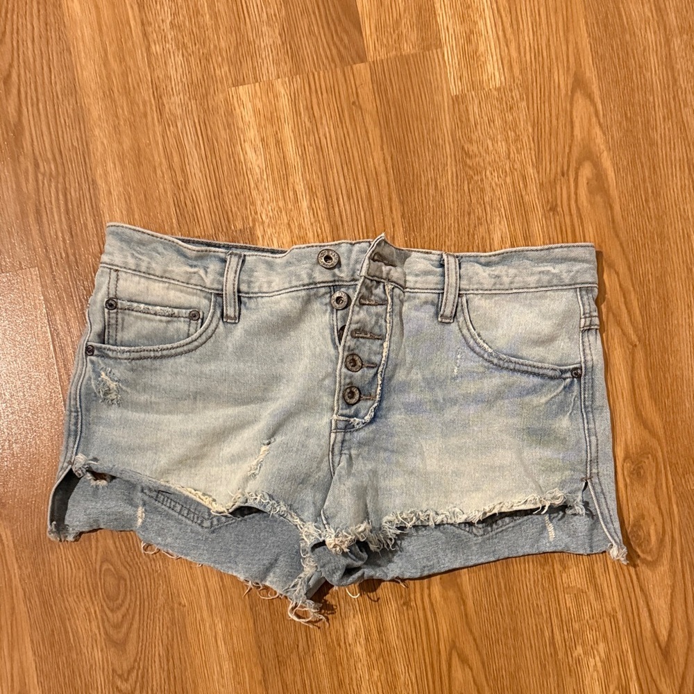 Free people distressed mid rise denim shorts light wash
